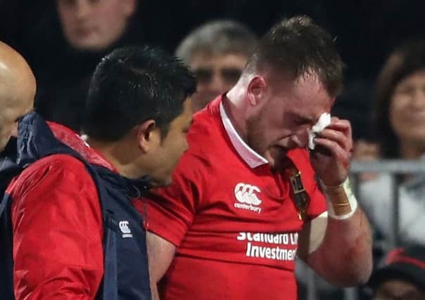Stuart Hogg leaves the field with a facial injury in the Lions' win over Crusaders. Picture: David Rogers/Getty Images