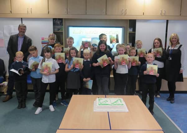 Gorebridge Primary Schools Book Publishers group celebrate the launch of whats thought to be the first ever virtual reality activity and story book.