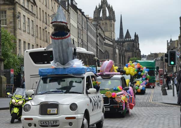 The Edinburgh Taxi Trade outing heads down the Royal Mile. Picture; Jon Savage