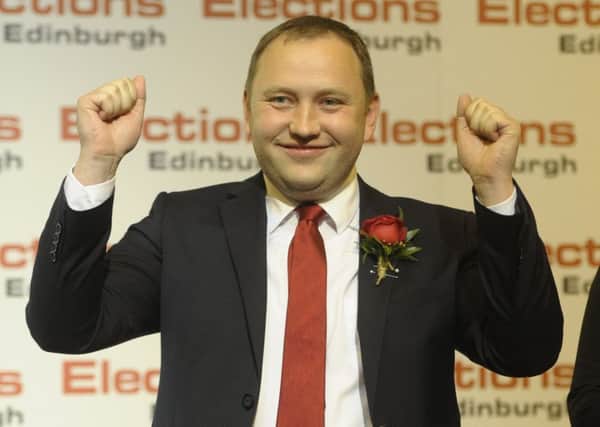 Ian Murray celebrates holding his seat at the Edinburgh count in Meadowbank. Picture: Neil Hanna