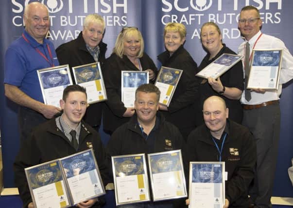 Craft Butcher Awards presentations - Hunters of Kinross receive their awards, pictured back from left, Tom Lawn of Scobies Direct, Frank Mitchell, Pamela Hunter, Liz Herkes, Judith Johnston from Lucas and Archie Hall from Dalziel.
Front from left, Conner Stewart, Iain Hunter and David Winton. Photo: Graeme Hart, Perthshire Picture Agency.
