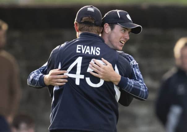 Scotland's Ali Evans celebrates with Chris Sole