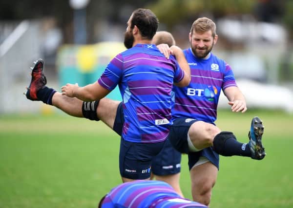 Josh Strauss and John Barclay do some stretching exercises at the Coogee Oval, Sydney. Pic: Fotosport/David Gibson
