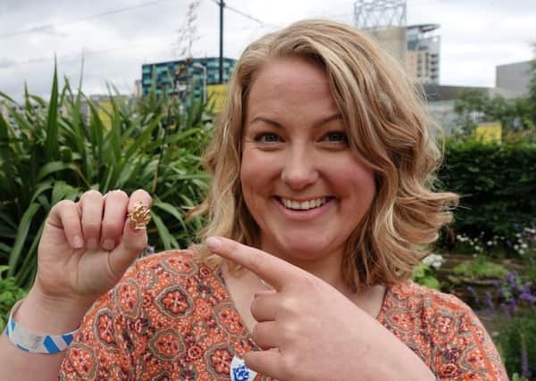Mollie Hughes with her gold Blue Peter badge. Picture; SWNS