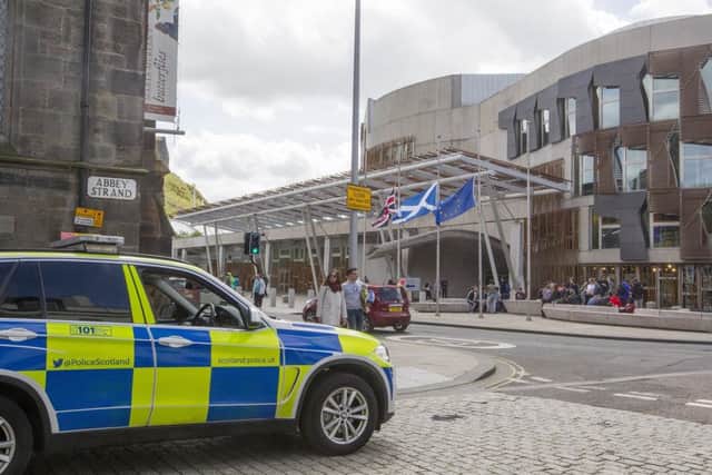 Police Scotland will remain outside the Scottish Parliament in Edinburgh. Picture; SWNS