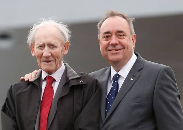Alex Samond pictured with his father Robert in 2014. Picture: PA