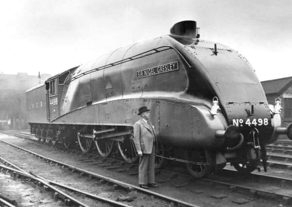 Sir Nigel Gresley with the train named after him.