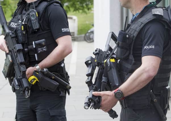 Police carried out armed raids early this morning. Picture; SWNS