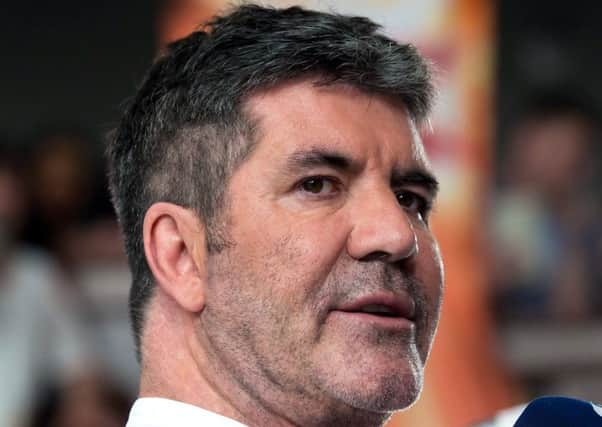 The track by SImon Cowell was released today. Picture; PA