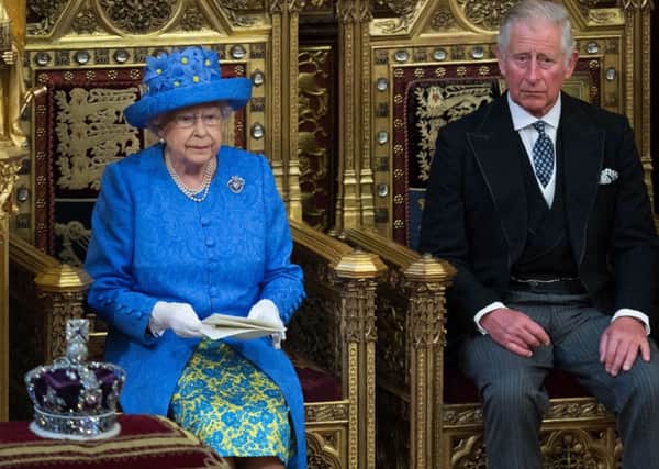 Queen Elizabeth II sits alongside Prince Charles, Prince of Wales as she delivers the Queen's Speech. Picture; Getty