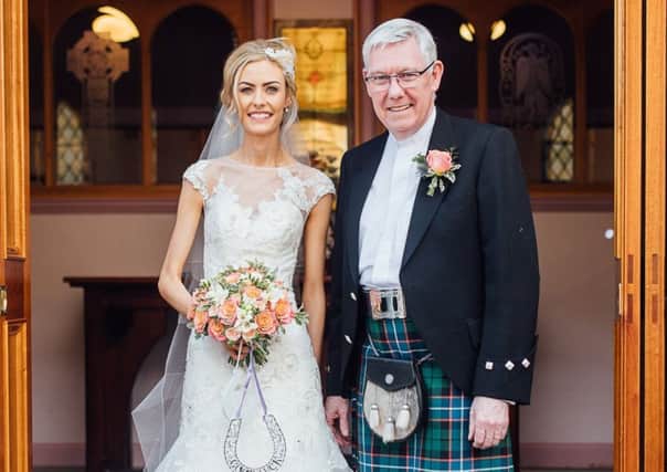 Lisa with her dad Rev John Mitchell at her weddiing.