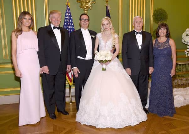 First Lady Melania Trump, President Donald Trump, Secretary of the Treasury Steven Mnuchin, Louise Linton, Vice President Mike Pence, and Second Lady Karen Pence.  (Photo by Kevin Mazur/Getty Images for LS)