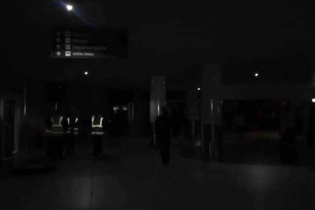 The security hall at Edinburgh Airport in near darkness. Picture: LuciaJWalker/Twitter