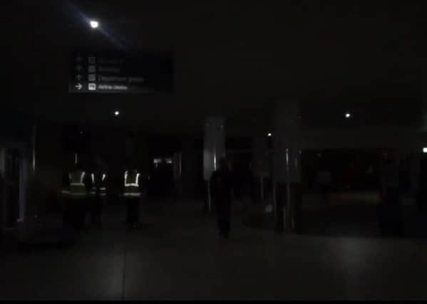 The security hall at Edinburgh Airport in near darkness. Picture: LuciaJWalker/Twitter