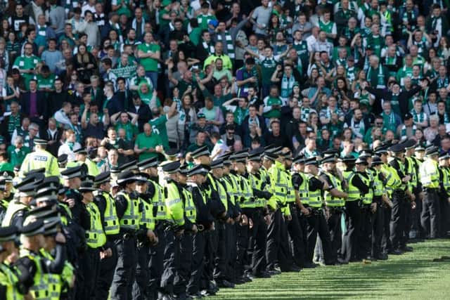 Police have tracked down over 180 fans from the Scottish Cup final - but more than 100 remain unidentified. Picture: Robert Perry/TSPL