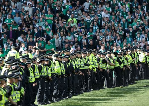 Police have tracked down over 180 fans from the Scottish Cup final - but more than 100 remain unidentified. Picture: Robert Perry/TSPL