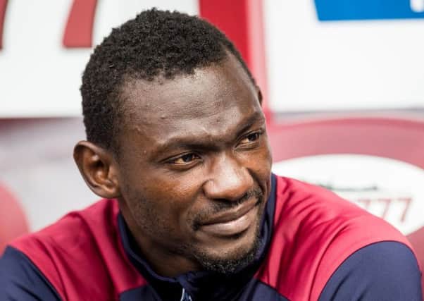 Juwon Oshaniwa has left Hearts a year before his contract was due to expire.
