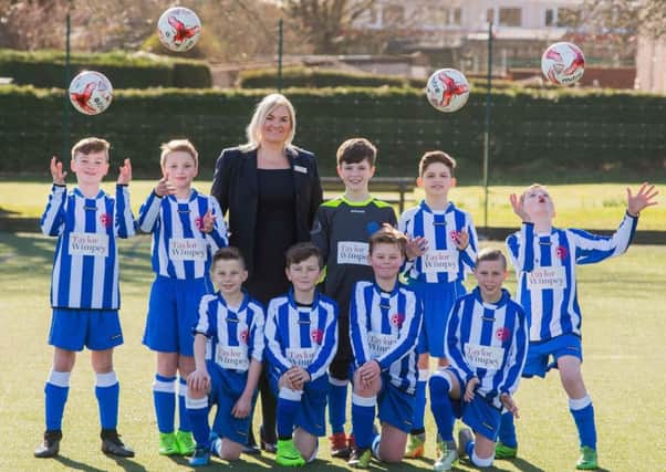 Penicuik Youth FC receive new strips from Taylor Wimpey