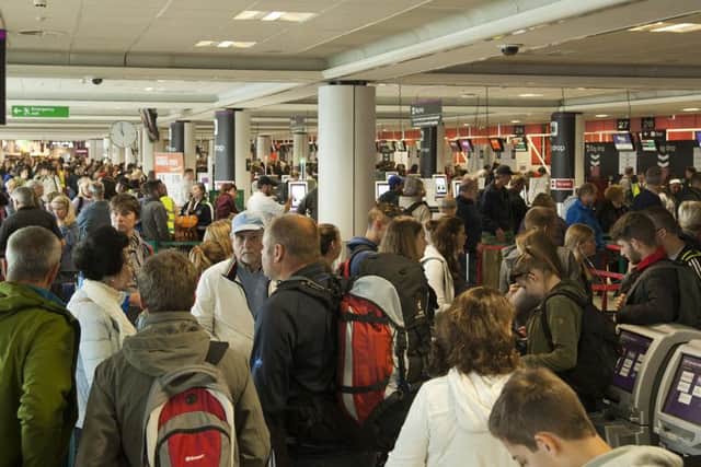 Crowds at edinburgh airport after a power cut yesterday.
