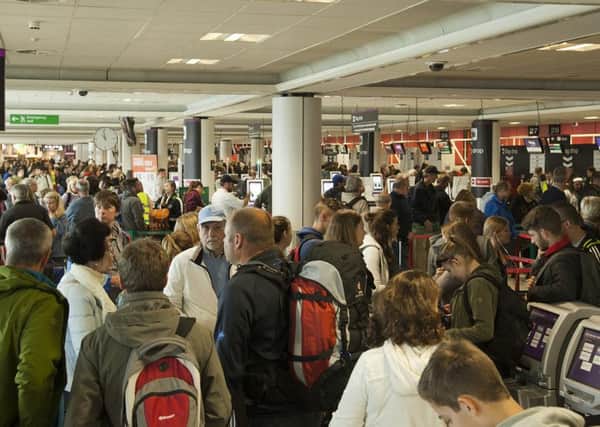 Crowds at edinburgh airport after a power cut yesterday.