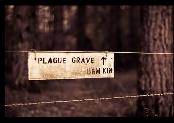 The sign to the plague grave in Devilla Forest. PIC: Flickr/Creative Commons/Euan Morrison