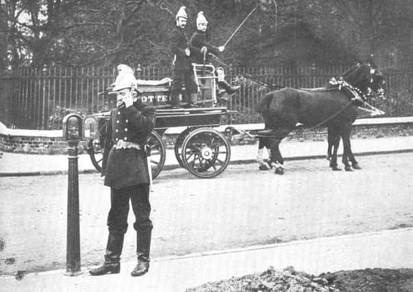 A photo dated circa 1910 of a pre 999 telephone alarm post. Picture: PA/BT