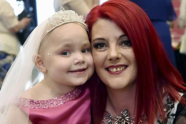 Eileidh, 5, and mum Gail Paterson from Forres, Moray, at the ceremony in at the AECC, Aberdeen.Picture: SWNS