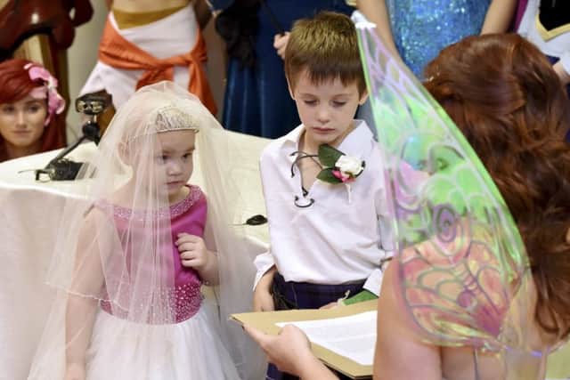 Eileidh PatersonHarrison Grier, 6, both from Forres, Moray, at the ceremony in at the AECC, Aberdeen.Picture: SWNS