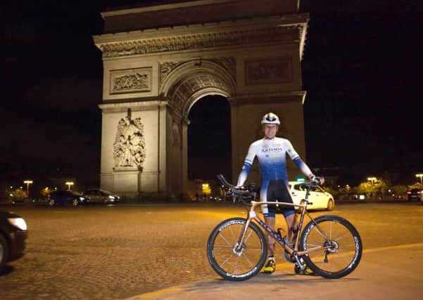 Mark Beaumont, 34, set off from under the Arc de Triomphe in Paris, France, on his attempt to reclaim the world record for circumnavigating the globe. Picture: PA
