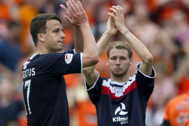 Boyle, right, applauds the travelling fans after making his Dundee debut in a Tayside derby in 2012