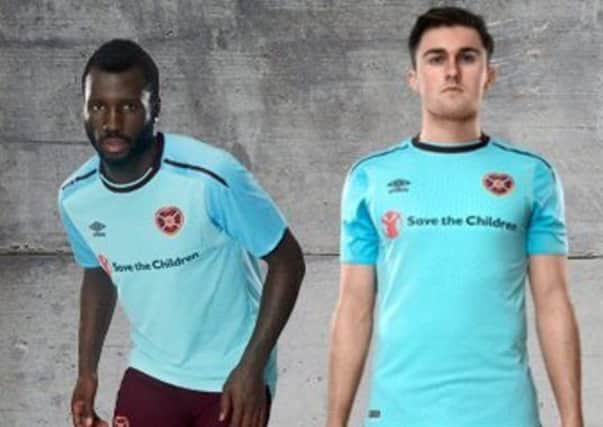 Esmael Goncalves and John Souttar show off the new Hearts away kit. Pic: Umbro