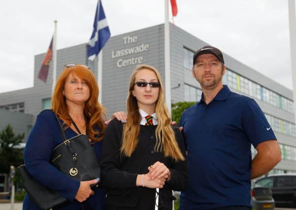 Louise  and Steven Gough with their daughter Samantha at Lasswade High School.