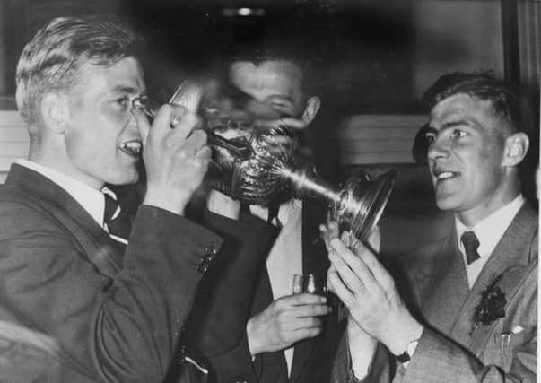 Willie Bauld drinks from the Scottish Cup