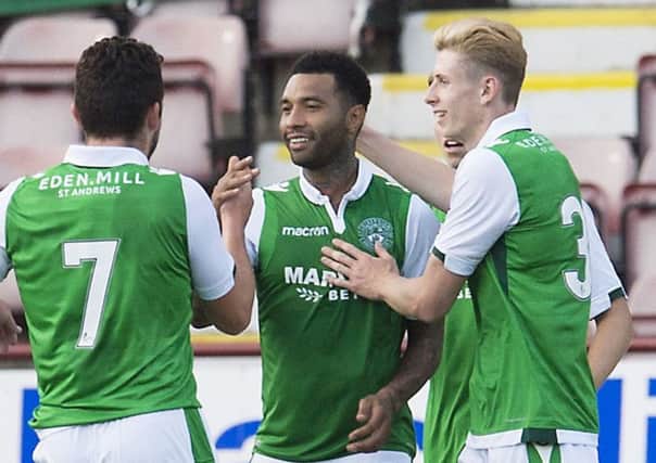 Jermaine Pennant is congratulated after scoring Hibs second goal against Dunfermline