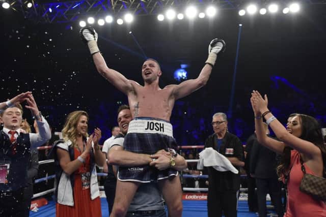 Joy for Josh Taylor after his victory over Ohara Davies at Braehead. Picture: Andy O'Brien