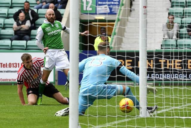 Martin Boyle pulls a goal back for Hibs. Pic: SNS