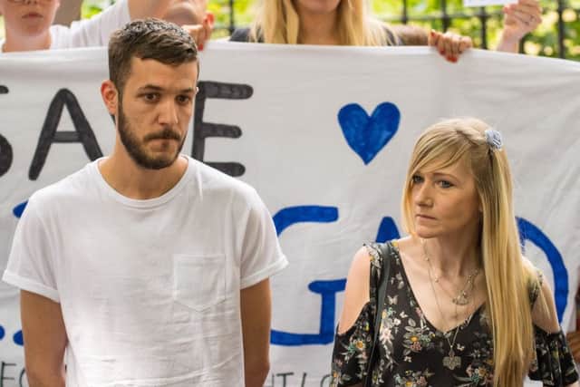 Parents of Charlie Gard, Connie Yates and Chris Gard, speak to the media in Queen Square, London. Picture: Dominic Lipinski/PA Wire