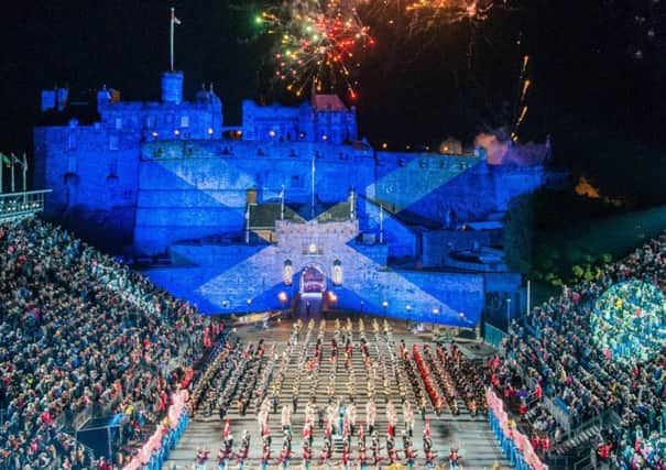 Brigadier David Allfrey, below, has called for an overhaul of how organisers of events like the Tattoo, above, are being charged. Photograph: Ian Georgeson