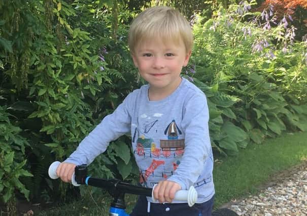 Sir Chris Hoy shared a photo of his son, Callum, two, on his first bike.
