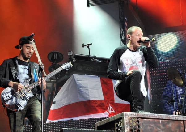 Linkin Park's Mike Shinoda with Chester Bennington (right) who has died, the Los Angeles County coroner has said. Picture; PA