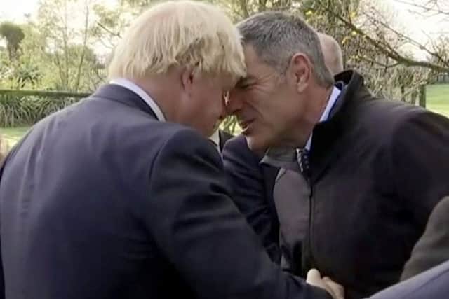 Boris Johnson, left, performs a traditional Maori greeting with New Zealand's Minister for Primary Industries Nathan Guy. Picture: AP