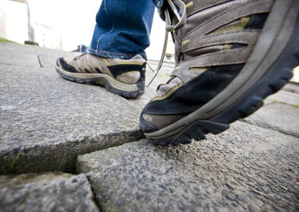 Cracked pavements have cost the council nearly Â£800k in compensation pay-outs after people have tripped and injured themselves. Picture: Ian Georgeson