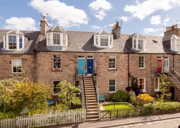 The colonies were designed to be flats that felt like a house, giving families their own front door and garden. Picture: Contributed
