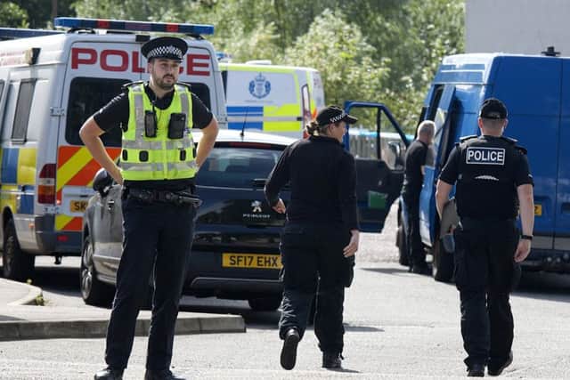 Police on the scene on Sunday.