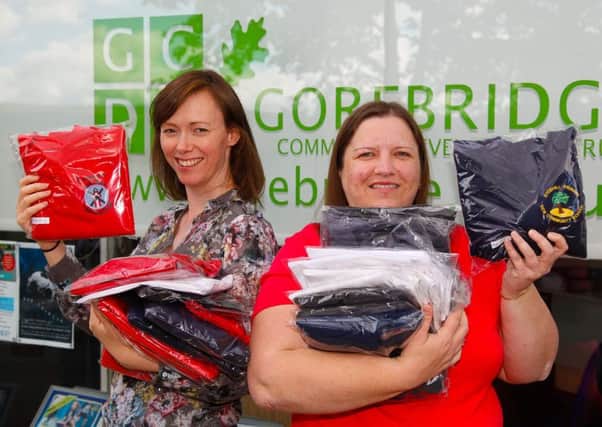 Jaimie MacDonald (Carbon Reduction Community Development Officer) and Linda Melrose (Administrator/Book-keeper) both of Gorebridge Community Development Trust. Linda came up with the idea of a pilot scheme for a clothes bank. (Picture: Scott Louden)