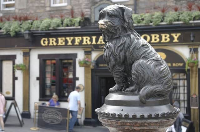 The Greyfriars Bobby statue at the junction of George IV Bridge and Candlemaker Row.