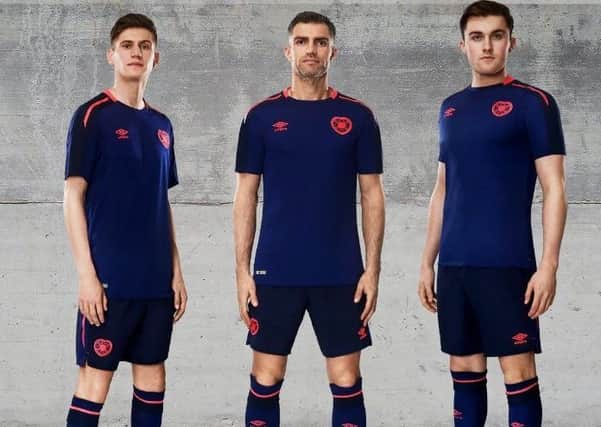 Rory Currie, Aaron Hughes and John Souttar model the new Hearts third kit