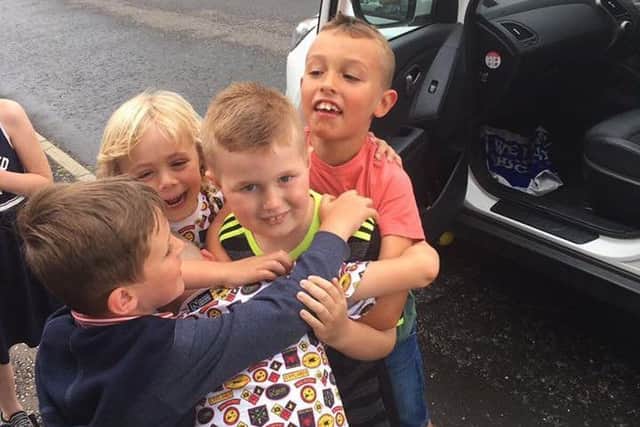 Luke with some of his friends.