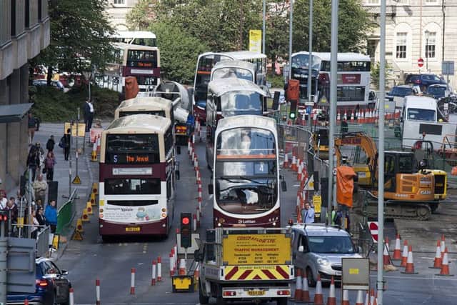 Buses are still currently using Leith Street despite heavy road works. Picture: Alistair Linford