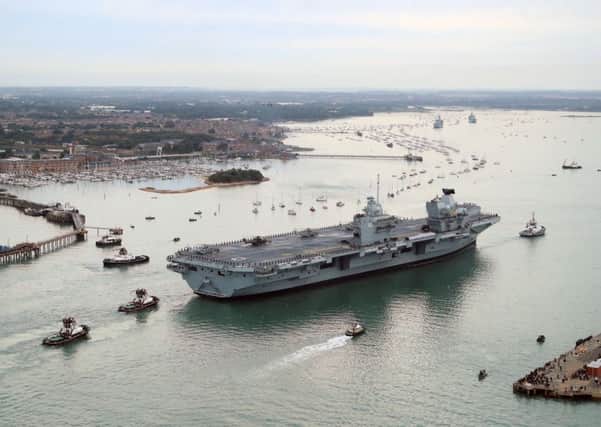 HMS Queen Elizabeth, the UK's newest aircraft carrier, arrives in Portsmouth. Picture: PA